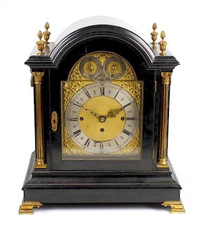 A good late 19th century ebonised triple fusee bracket or table clock The 8-inch arched brass dial h