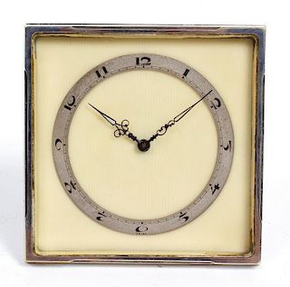 A Swiss Art Deco desk timepiece. The 3-inch Arabic chapter ring and blued steel hands upon a cream p