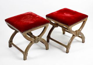 A pair of Victorian Gothic revival oak X-frame stools, in the manner of A.W.N Pugin, with padded plu