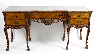 An American carved mahogany, inlaid walnut and rosewood sideboard 20th century, the mahogany top of