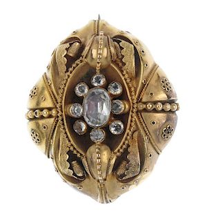 A late Victorian gem memorial brooch. Of oval outline, with applied leaf and bead detail to the cent