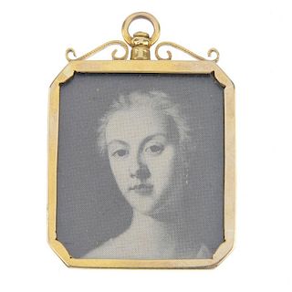 A late 19th century 9ct gold photograph pendant. Of rectangular-shape outline, the engraved monogram