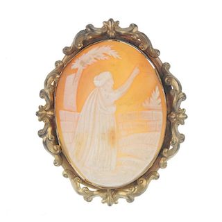 A cameo brooch. Of oval outline and depicting one of the Three Wise Men, pointing to the sky, to the