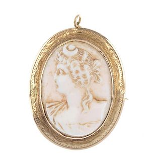 A shell cameo brooch. Carved to depict a lady in profile. Marks indicating gold. Length 4.5cms. Weig