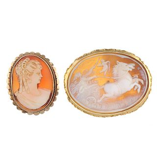 Two cameo brooches. Both of oval outline, the largest depicting a horse drawn chariot being ridden b