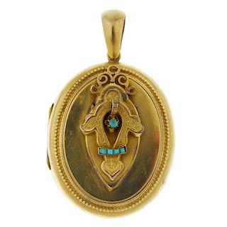 A late 19th century gold turquoise locket. Of oval outline, the raised central panel with engraved d