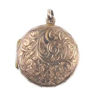 A late 19th century locket. Designed as a circular locket, engraved to both front and back with acan