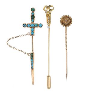 Ten stickpins. To include one designed as a dagger, the grip and removable scabbard, set with circul