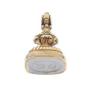 A late 19th century 15ct gold fob. The white chalcedony intaglio fob, with initials to the centre an