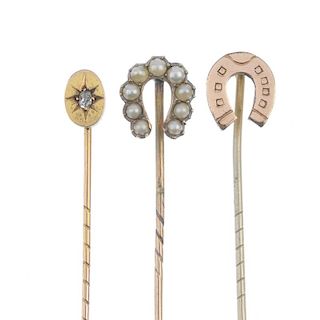 Six stickpins. To include a stickpin set with a circular opal cabochon to the centre of the shamrock