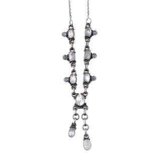 A moonstone necklace. Designed as oval and circular moonstone cabochon links to the two central susp