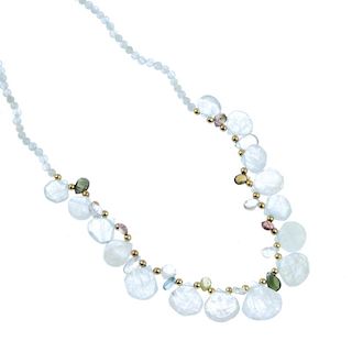 An aquamarine and multi-gem necklace. The row of spherical aquamarine beads to the pear shape aquama