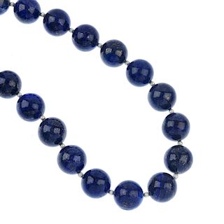A lapis lazuli necklace, cufflinks and ear studs. The necklace comprising a series of twenty spheric