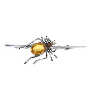 Three items of gem jewellery. To include a silver Charles Horner bar brooch, designed with a spider