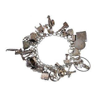 Two charm bracelets and four loose charms. Each a curb-link bracelet suspending a total of forty-two