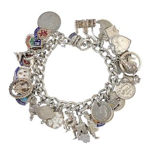 Two silver and white metal charm bracelets. The curb-link chains, suspending a total of forty-nine c