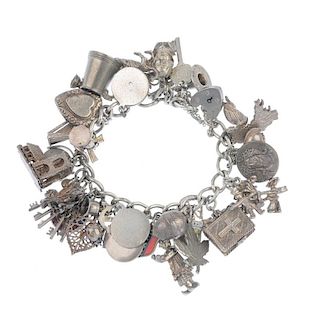 Two charm bracelets. The one curb-link and one fancy-link chain suspending sixty charms, including a
