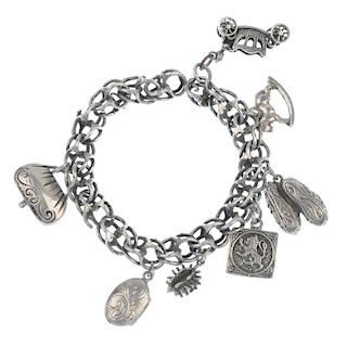 A selection of charms and broken charm bracelets. To include seventy-five charms and several pieces
