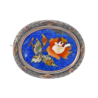 Four brooches and a ring box. One brooch of oval outline, the floral and foliate border to the pietr