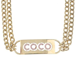 CHANEL - a belt. The front designed as a rectangular panel, with pink-gem 'Coco' motif, to the conne
