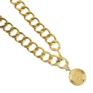 CHANEL - a belt. Designed as a series of curb links, with hook and imitation coin terminals. May be