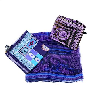 VERSACE - three silk scarves. To include a purple and black ornamental leopard print scarf, a purple