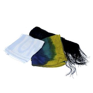 Three designer scarves. To include an open knit black shawl with fringed ends by Gucci, a square pai
