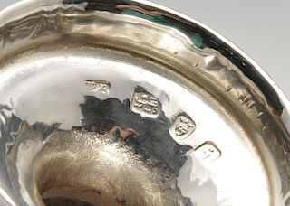 A George III silver caster of baluster form with diaper pierced cover. Hallmarked Hester Bateman, Lo