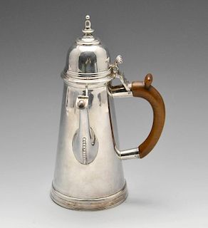 An Edwardian Britannia silver chocolate pot of traditional form, the plain tapering body, to the bea