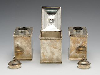 A set of three George III silver caddies, comprising a pair of tea caddies and a sugar box, each of