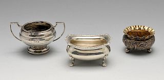 An early twentieth century silver open salt and pepper, hallmarked Sheffield 1915. Together with thr