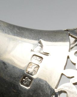 A George V silver tazza, having wide scrolling foliate pierced border and shallow dish leading to th