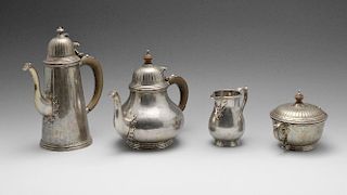 A 1960's silver four piece tea service, comprising teapot, coffee pot, milk jug and twin-handled sug