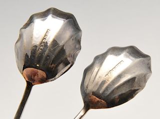 A cased set of six silver plated coffee spoons, each having coffee bean terminal and plain stem lead