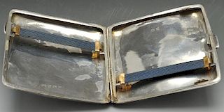Two 1920's silver cigarette cases, the first of rounded square form with foliate scroll engraving th