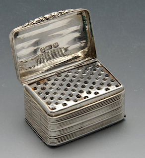 A George IV silver nutmeg grater, the oblong reeded form with dual hinges, crested cartouche and flo
