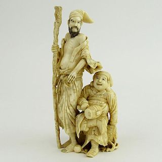 Japanese Meiji Carved Ivory Figural Group. Two Men. Signed on bottom. Good condition.
