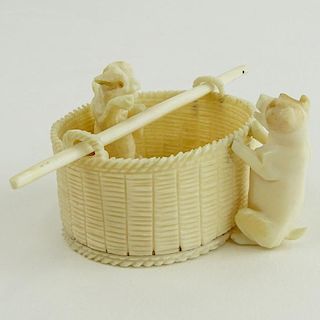 Antique Continental Carved Ivory Figure "Dog and Cat in Basket".