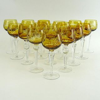 Lot of 16 Bohemian Cut Glass Wine Hocks in Amber. Various stems