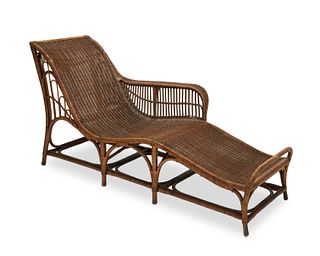 A Dryad cane chaise lounge