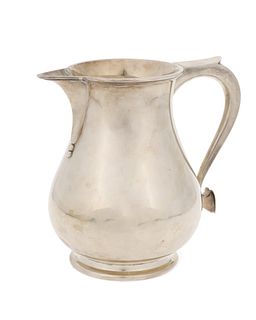 An English sterling silver water pitcher