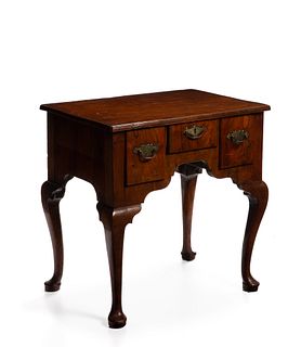 An English Queen Anne-style lowboy