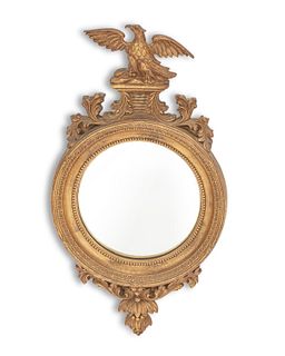 A Syracuse Ornamental Company giltwood bull's eye wall mirror