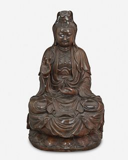A patinated bronze Buddha