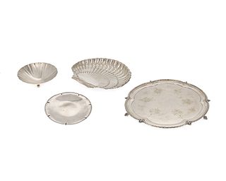 A group of silver holloware trays