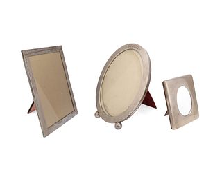 Three sterling silver table-top picture frames