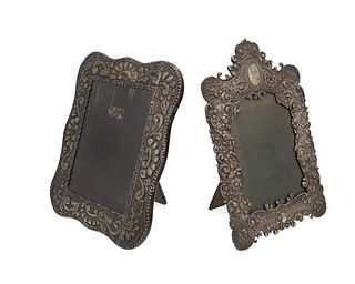 Two silver table-top picture frames