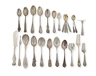 A group of sterling and plated silver flatware