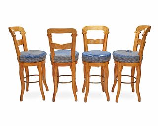 A set of koa wood bar chairs