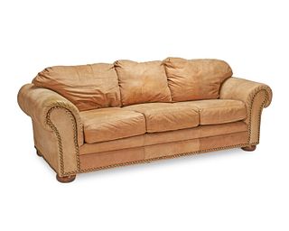 A contemporary ranch-style leather sofa